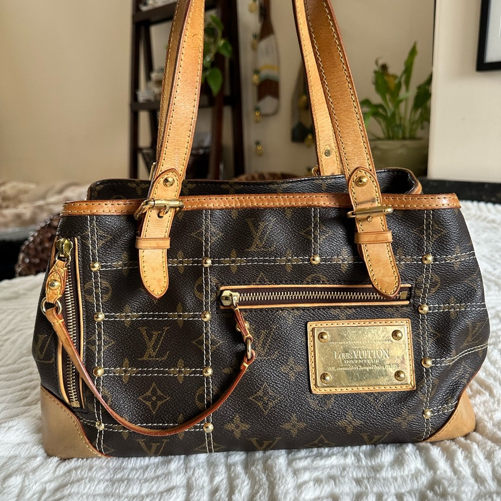Authentic Louis Vuitton
LV Monogram Riveting Vintage